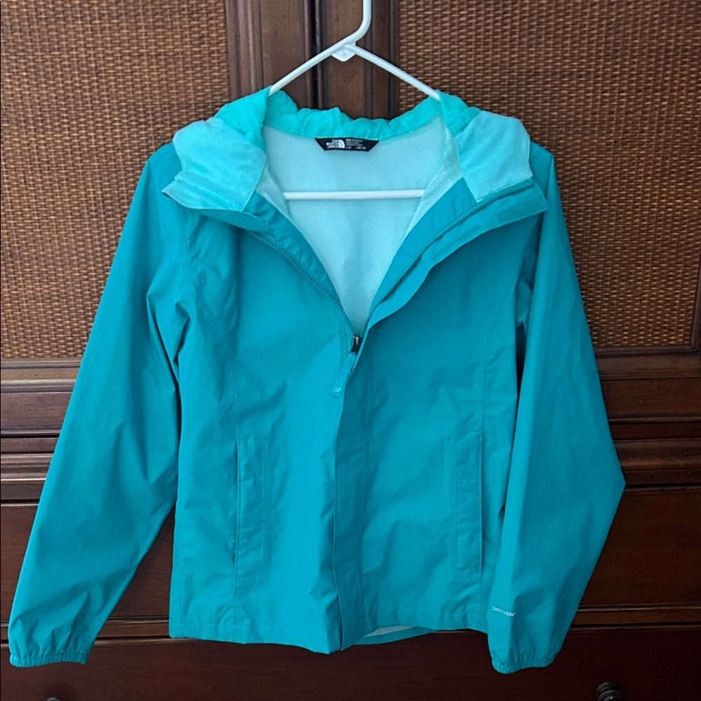 The North Face Girls Rain Jacket. Teal color (greenish/blue). Size Large (14/16)